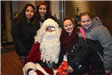 Four Girls Take a Picture with Santa