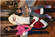 Sisters Take a Picture with Santa