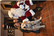 Two Women and a Golden Retriever with Take a Picture with Santa 2