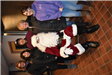 Community Members Take a Picture with Santa