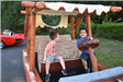 Young Boys play on a Flintstones Themed Car 2