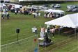 Fair-Goers Wave at the Drone in the Sky Taking Their Picture
