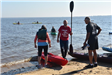 Individuals Boarding Kayaks
