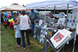 Man Vending His Prints and Paintings