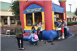 Parents Supervise Their Kids Inside an Inflatable Jump House