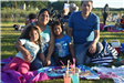 Family of Four Having a Picnic 4