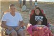 Father and Daughter Having a Funnel Cake