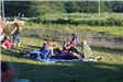 Large Family Hanging out on a Picnic Blanket