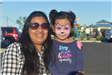 Mother and Her Daughter Wearing Face Paint