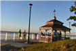 People over Looking the Bay from a Gazebo