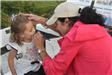 Young Girl Having Her Face Painted 1