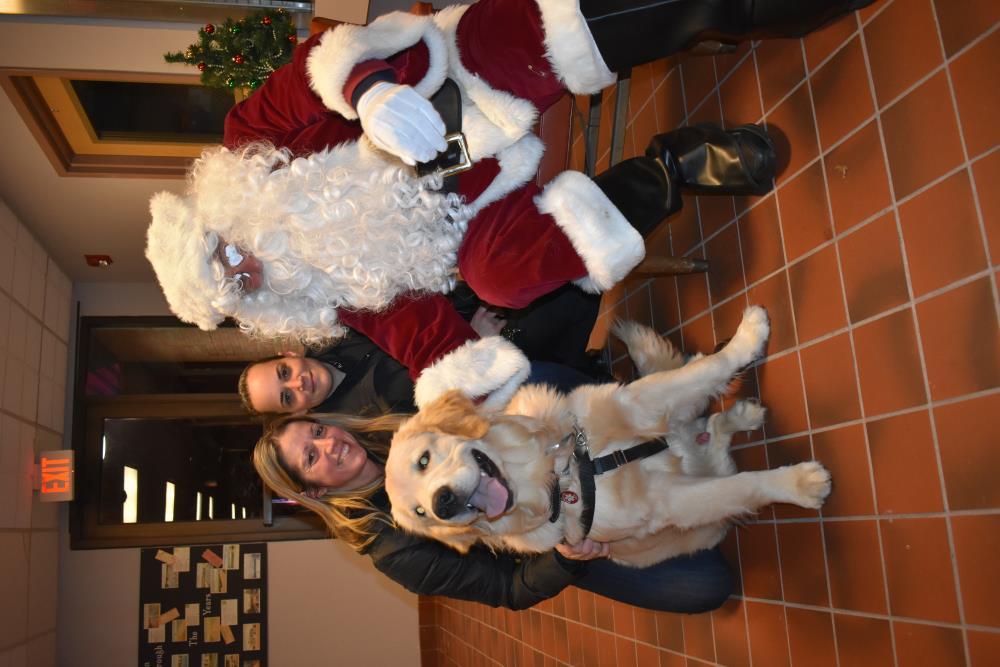 Two Women and a Golden Retriever with Take a Picture with Santa 2