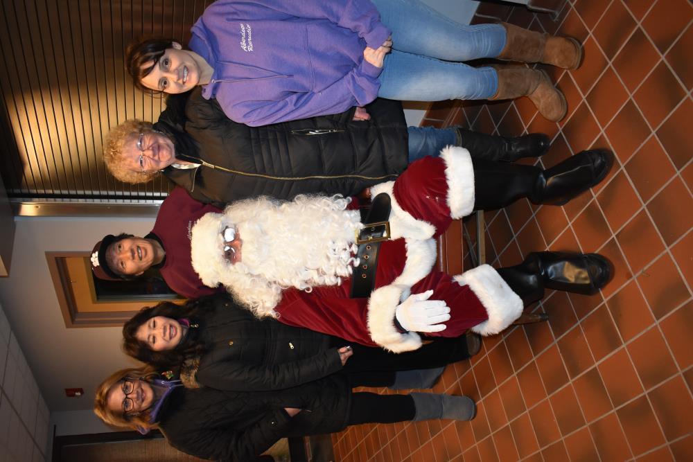 Community Members Take a Picture with Santa