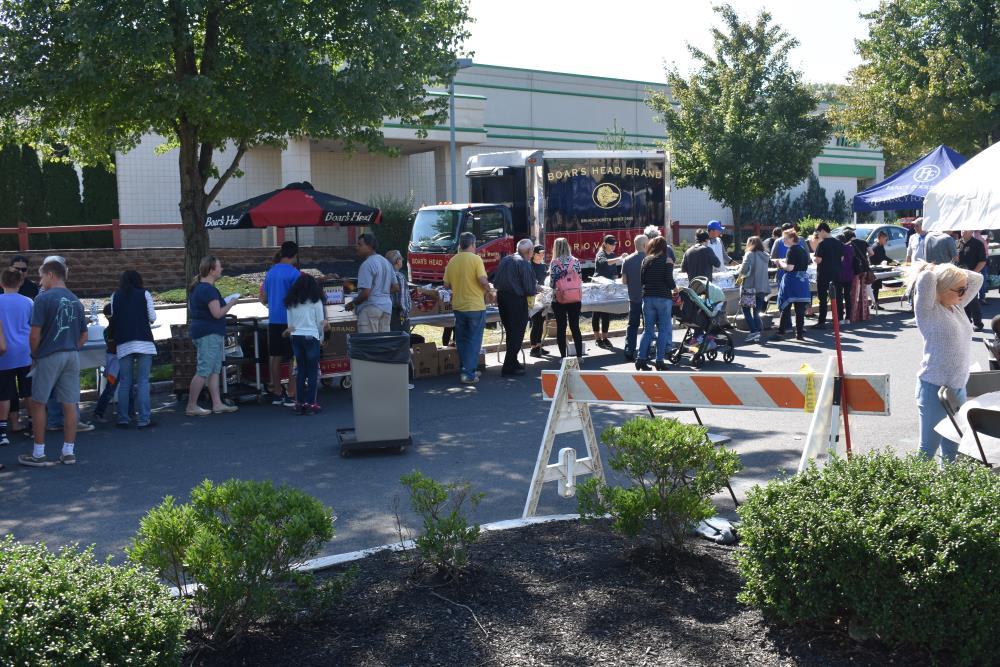 People Line up to Be Served Food