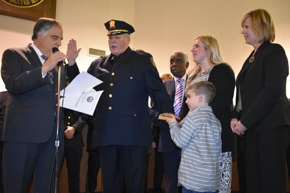 Derechailo Raising His Hand While Taking an Oath