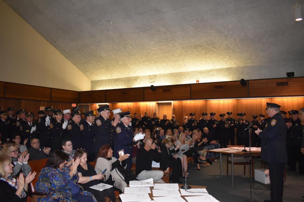 Room of Attendees Applaud Derechailo