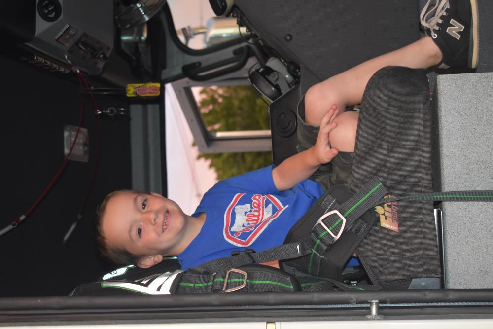 Kid Sitting in a Firetruck