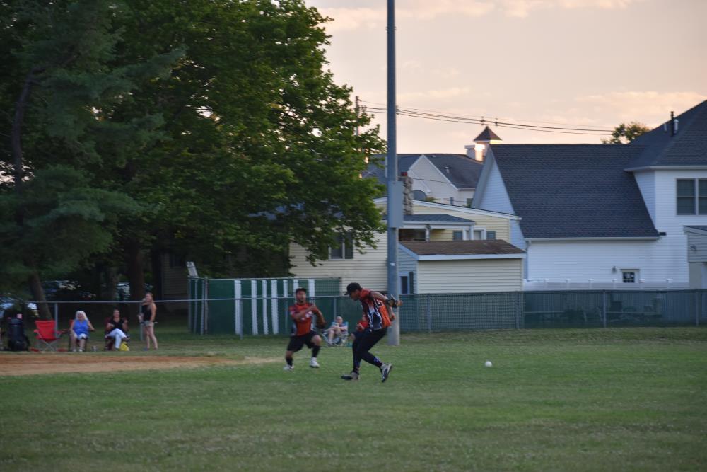 Opposing Team Chasing After the Ball