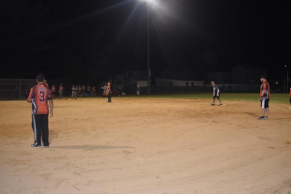 People Standing in the Infield