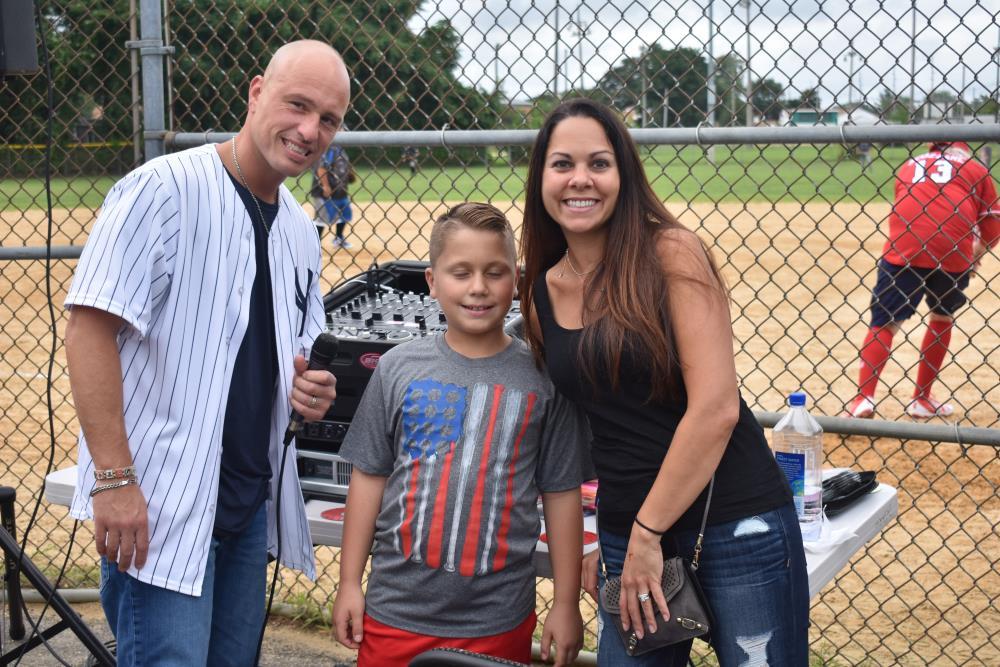 Commentator Takes a Second to Have His Photo Taken
