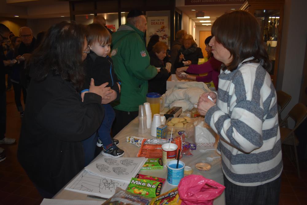 A Mother and Son at the Refreshments Table 1