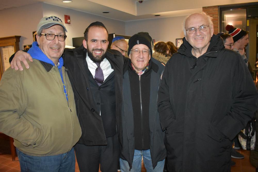 Group of Men Take a Group Phot a the Menorah Lighting Gathering